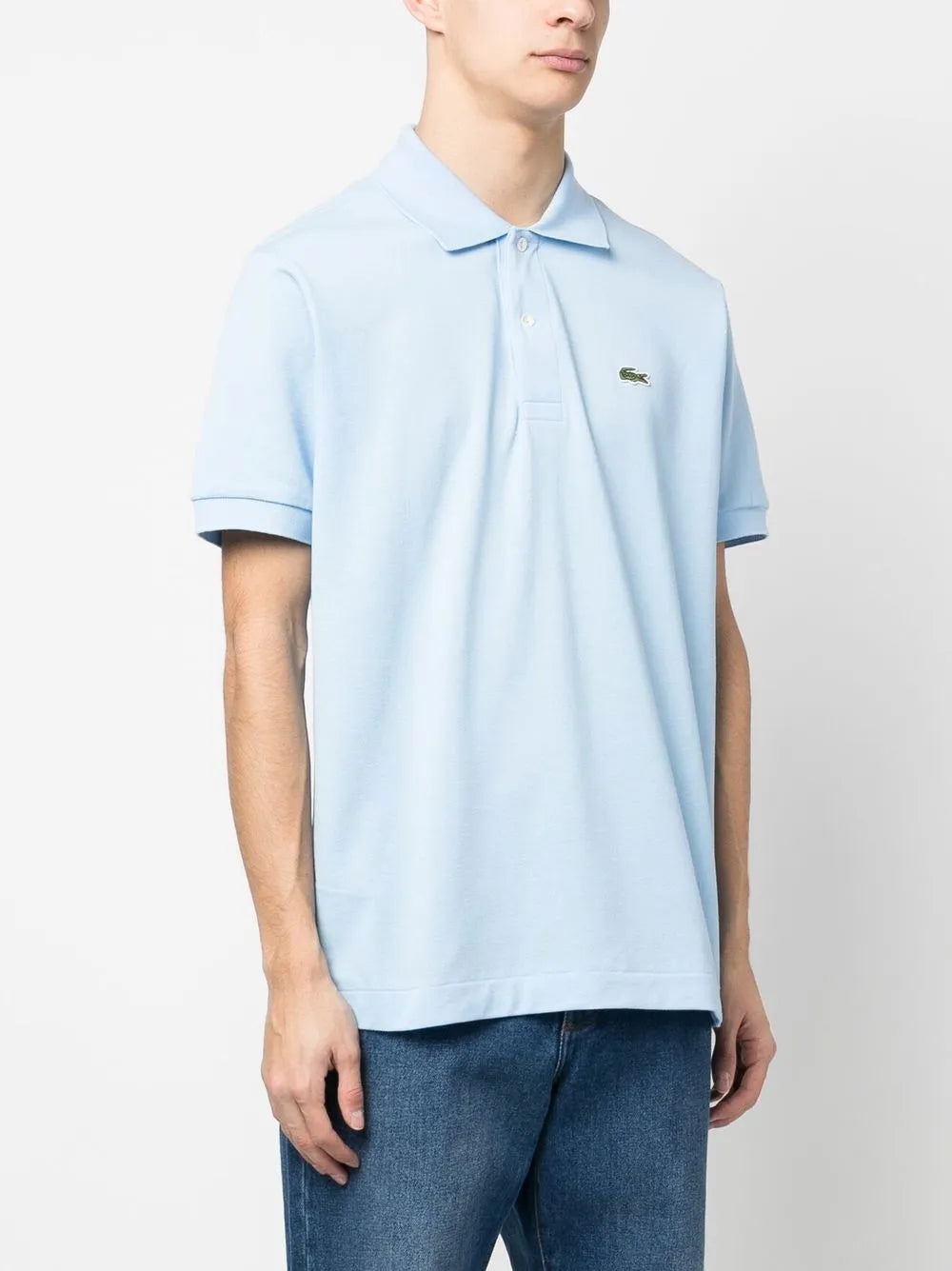 Camisa polo azul-claro com patch de logo