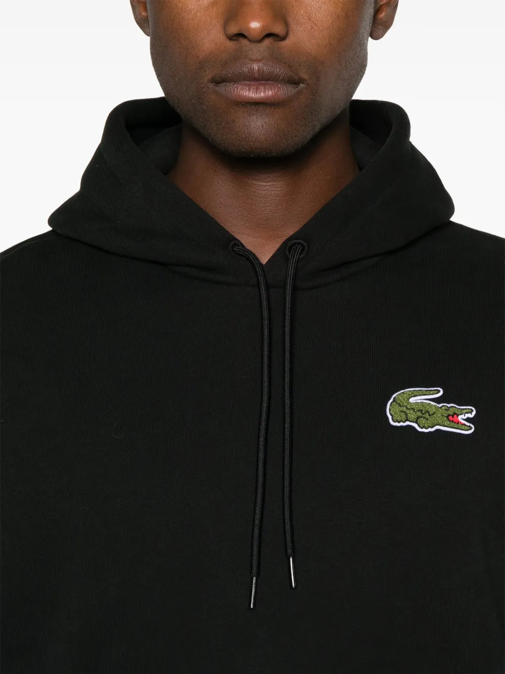 Casaco preto com patch de crocodilo