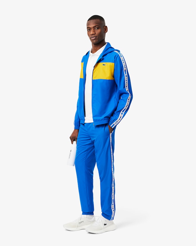 Casaco azul e amarelo Desportivo com logo