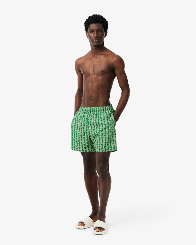 Shorts de banho de comprimento médio com estampa de monograma