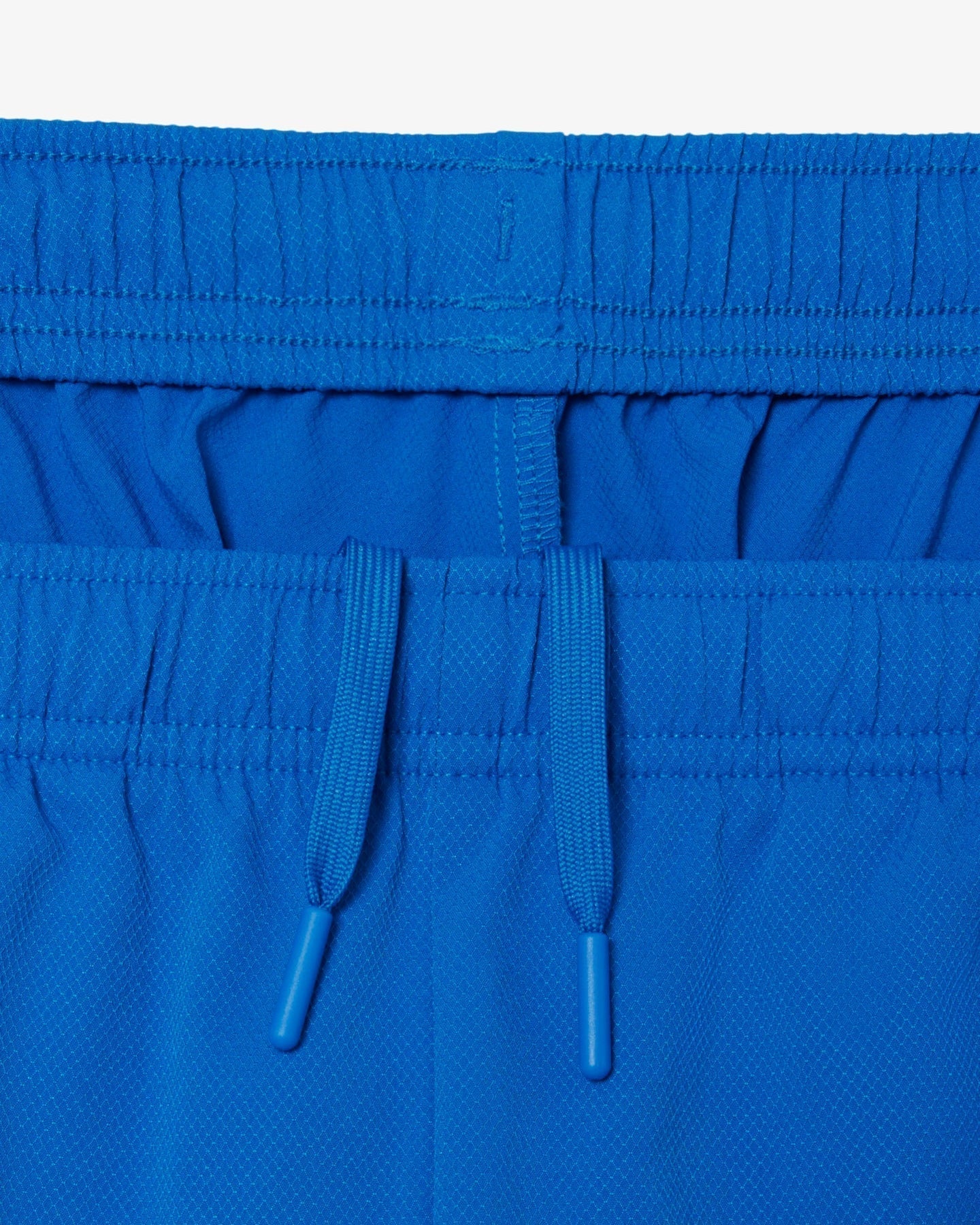 Conjunto verde e azul com logo