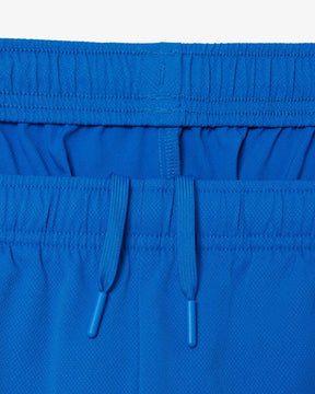 Conjunto verde e azul com logo